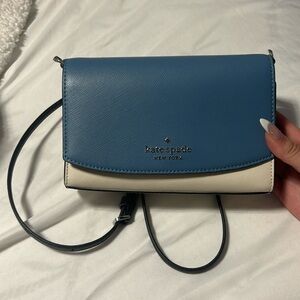 Blue, white, and navy Kate spade shoulder purse.